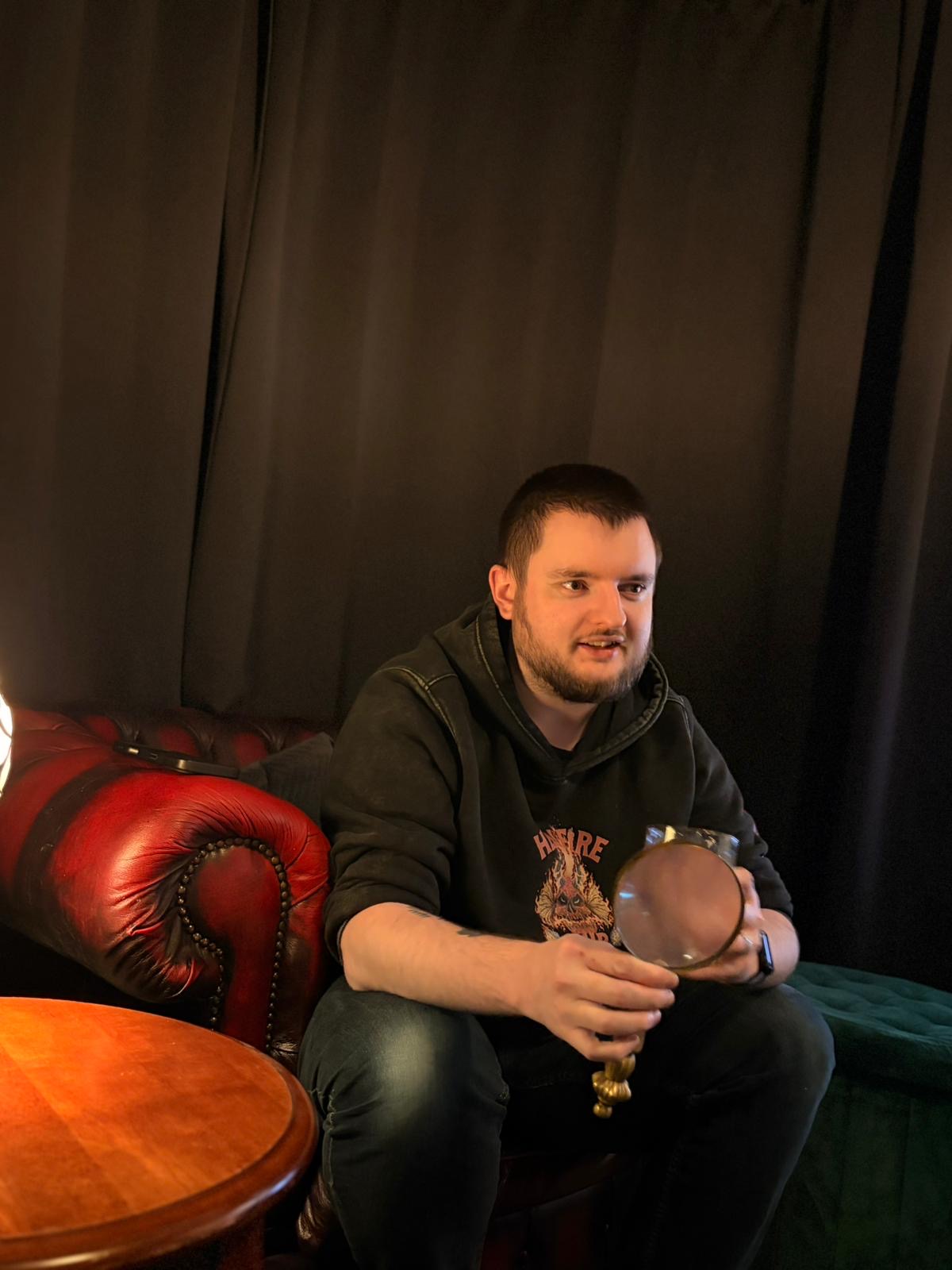 Smilar seated on a sofa